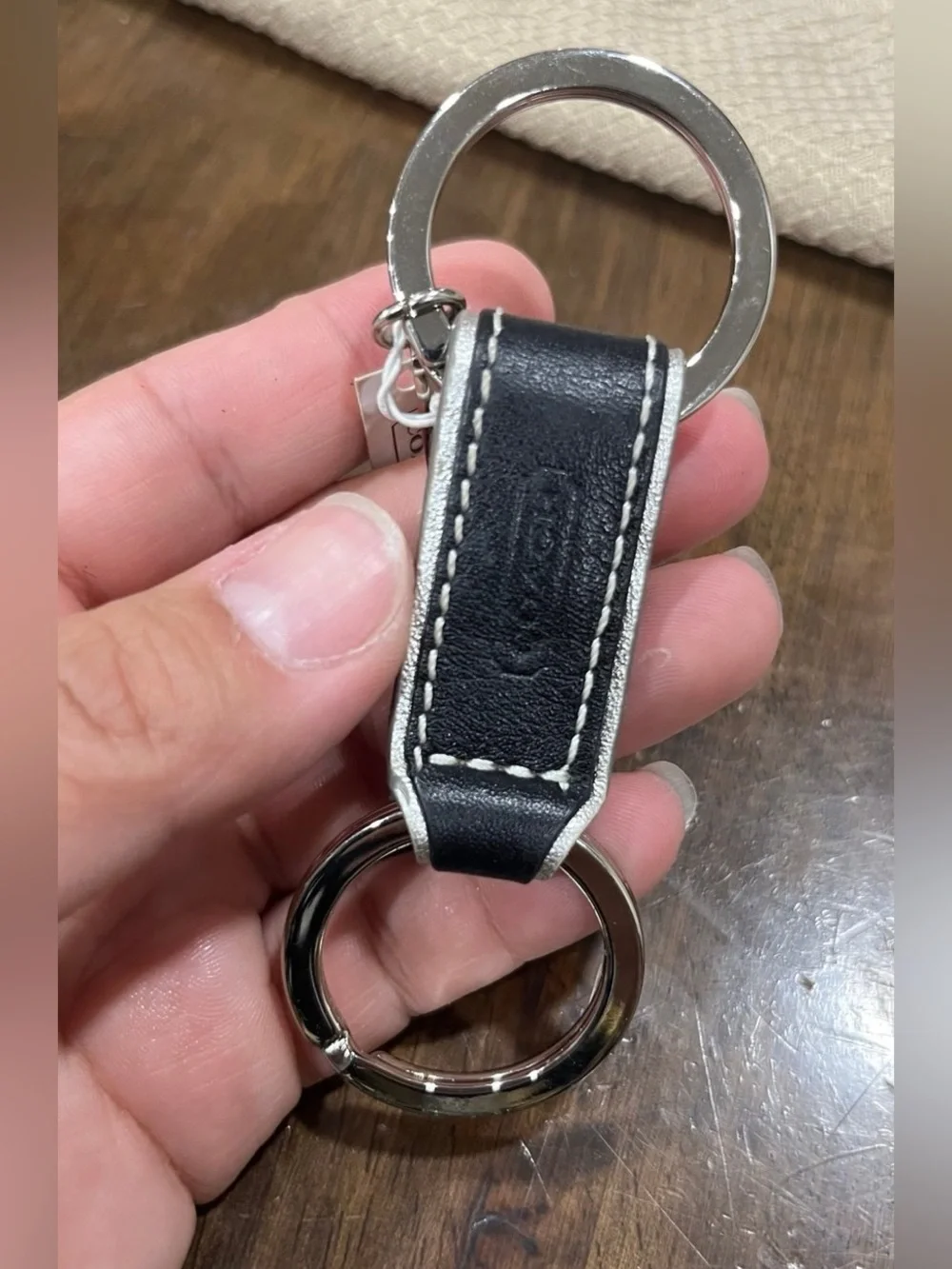 Coach Men’s Black Leather Keychain with Silver Hardware